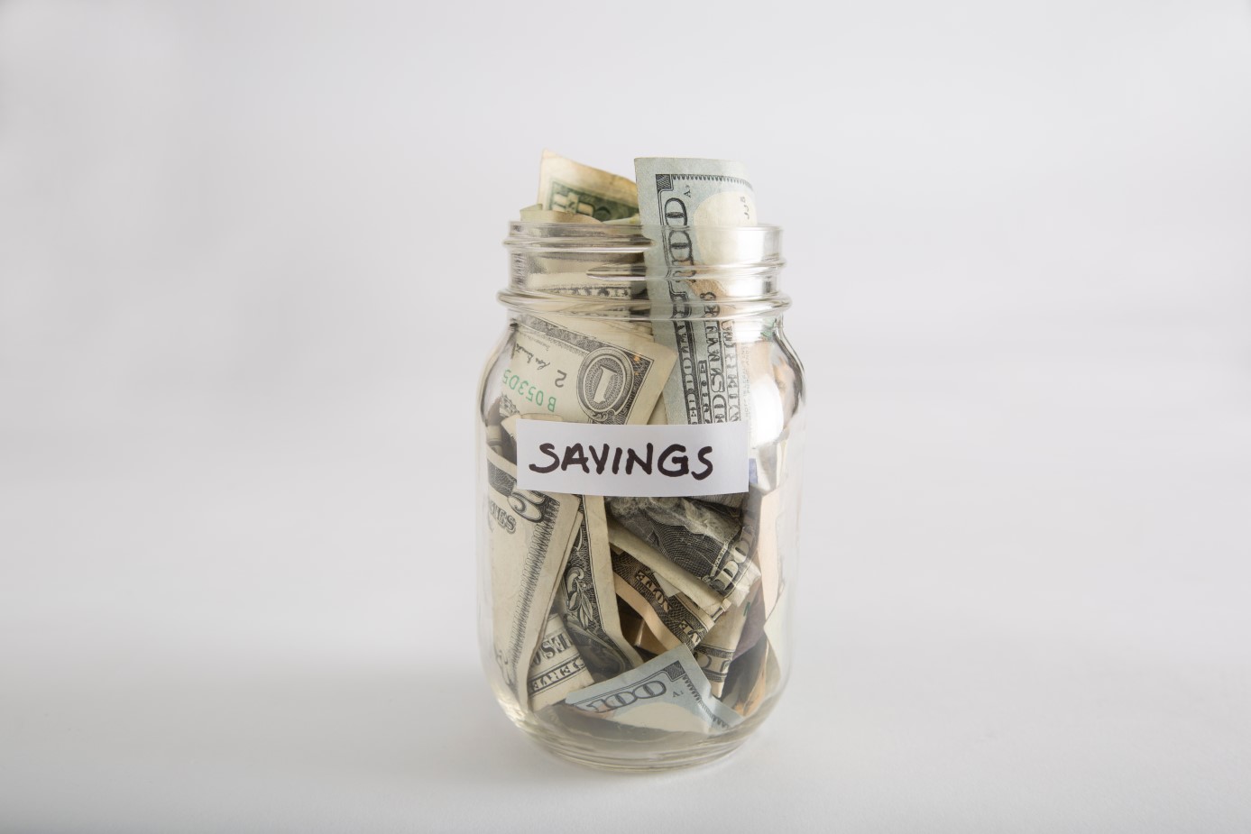 Closeup of Mason jar with money for savings
